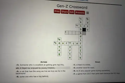 Rozwiązuję krzyżówkę "Gen-Z Crossword", gdzie odpowiedź na jedno z pytań, "zabawka dla dzieci", jest w ręku Fidiasza.